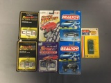 Group of 7 die cast vehicles in original packaging