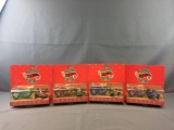 Group of 4 die cast Hot Wheels holiday special edition Car sets in original packaging
