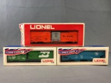 Group of 3 Lionel train cars in original packaging