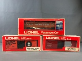 Group of 3 Lionel train cars in original packaging Pullman passenger car and box cars