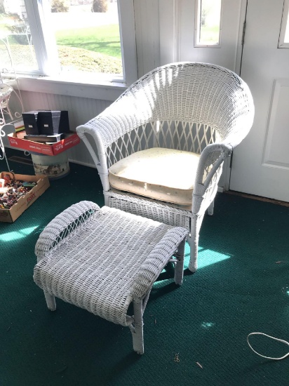 Antique wicker chair with ottoman