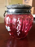 Hand painted covered glass jar with handle