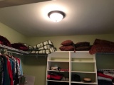 Group of pillows and hanging wardobes