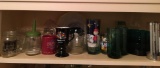 Shelf of miscellaneous kitchen glassware and more