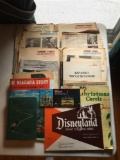 Group of vintage newspaper clippings, music books and more