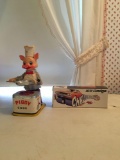 Group of 2 vintage toy piggy cook and Dodge Challenger