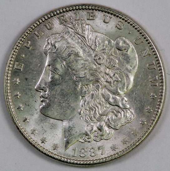 1887 P Morgan Silver Dollar.