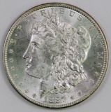 1887 P Morgan Silver Dollar.