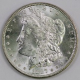 1887 P Morgan Silver Dollar.