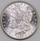 1887 P Morgan Silver Dollar.