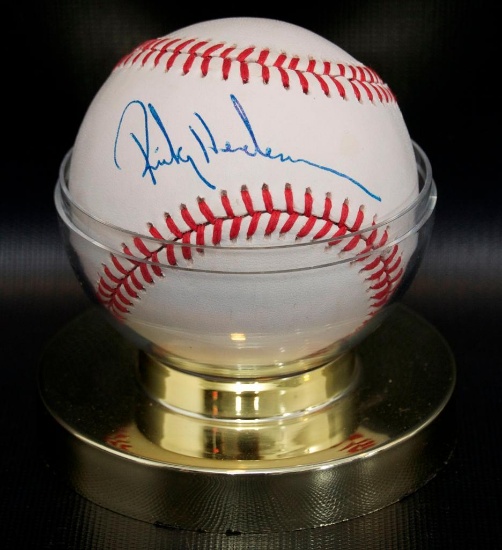 Signed Oakland A's Rickey Henderson Baseball with Holder