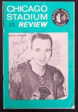 Team Signed Chicago Blackhawks 1960's Stadium Review with 10 Signatures