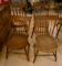 Group of four antique wood chairs