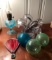 Group of glass items, globes, oil lamp and more