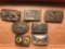 Group of 7 belt buckles