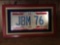 Framed bicentennial license plate