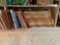 Shelf lot of military books and more