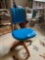 Vintage office chair with wheels in blue upholstery