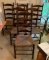 Group of six vintage ladder back rush weave chairs