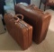 Group of 2 Vintage Wheary Leather Luggage