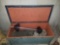 Vintage wood toy box with contents.