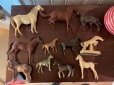 Group of vintage toy horses in statues