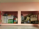 Cabinet contents above fridge- lightbulbs