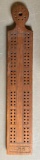 Vintage cribbage board with pegs