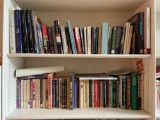 Two shelves of miscellaneous books