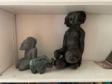 Group of two stone statues and one foam that you