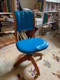 Vintage office chair with wheels in blue upholstery