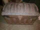 Antique trunk with interior compartments.