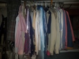 Dozens of vintage clothing shirts pants and more.