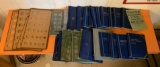 Large group of vintage empty coin books