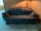 Floral pattern couch with wood back