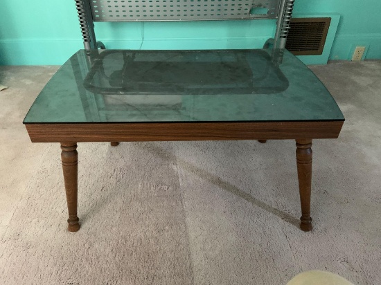 Vintage coffee table with glass top