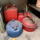 Group of five gas cans