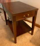 Wooden side table with drawer