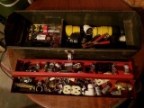 Tool box full of electrical supplies.