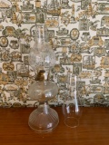 Antique oil lamp with extra chimney