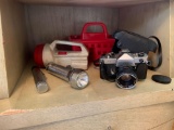 Group of flashlights and yashica camera