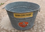 Vintage galvanized bucket with labels