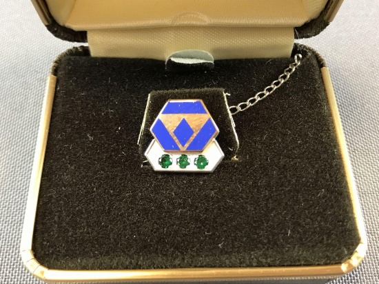 Sterling silver tie tack with emeralds