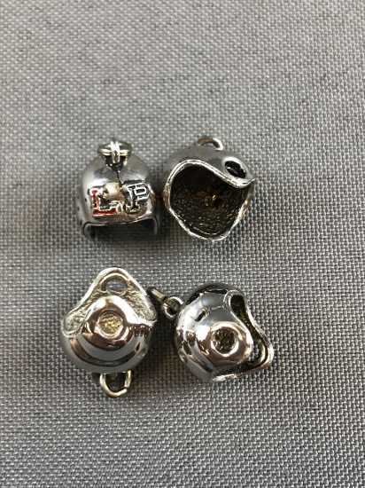 Group of 4 Sterling Silver helmet pendants