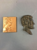 Group of 2 Metal Lincoln Head and J. Strauss Head
