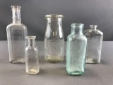 Group of 5 vintage glass bottles