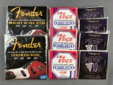 Group of 9 Guitar strings in packaging