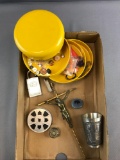Group of random items including film, crucifix, lock