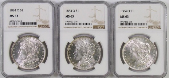Lot of (3) 1884 O Morgan Silver Dollars all (NGC) MS63.
