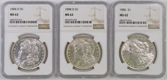 Lot of (3) Morgan Silver Dollars all (NGC) MS62.